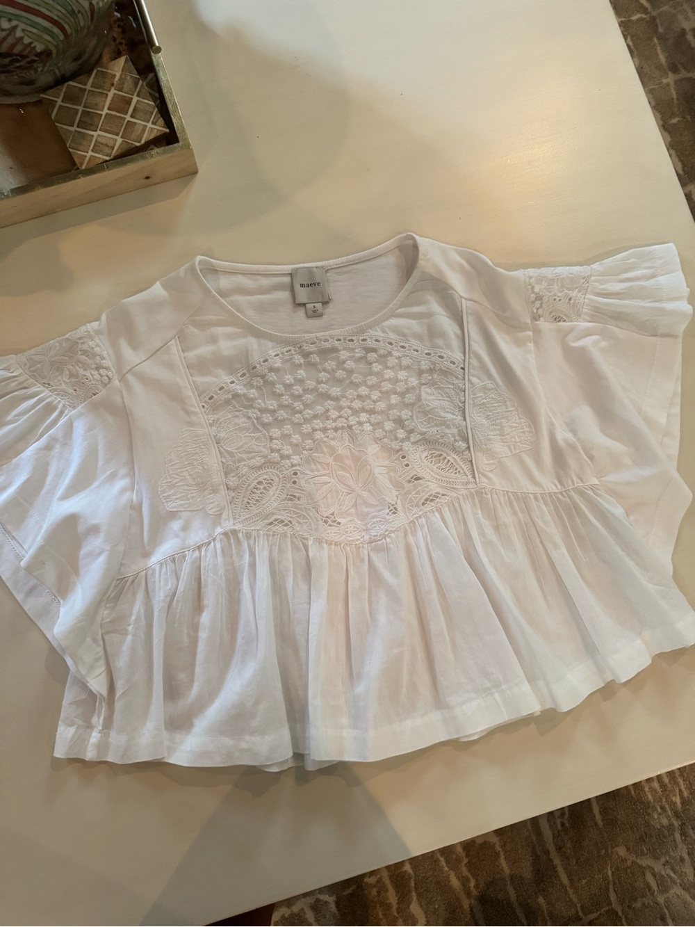 Maeve White Embroidered Peplum Flutter-Sleeve Top
